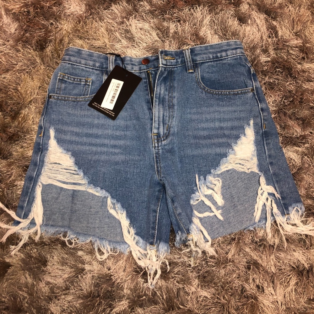 PrettyLittleThing distressed denim shorts
